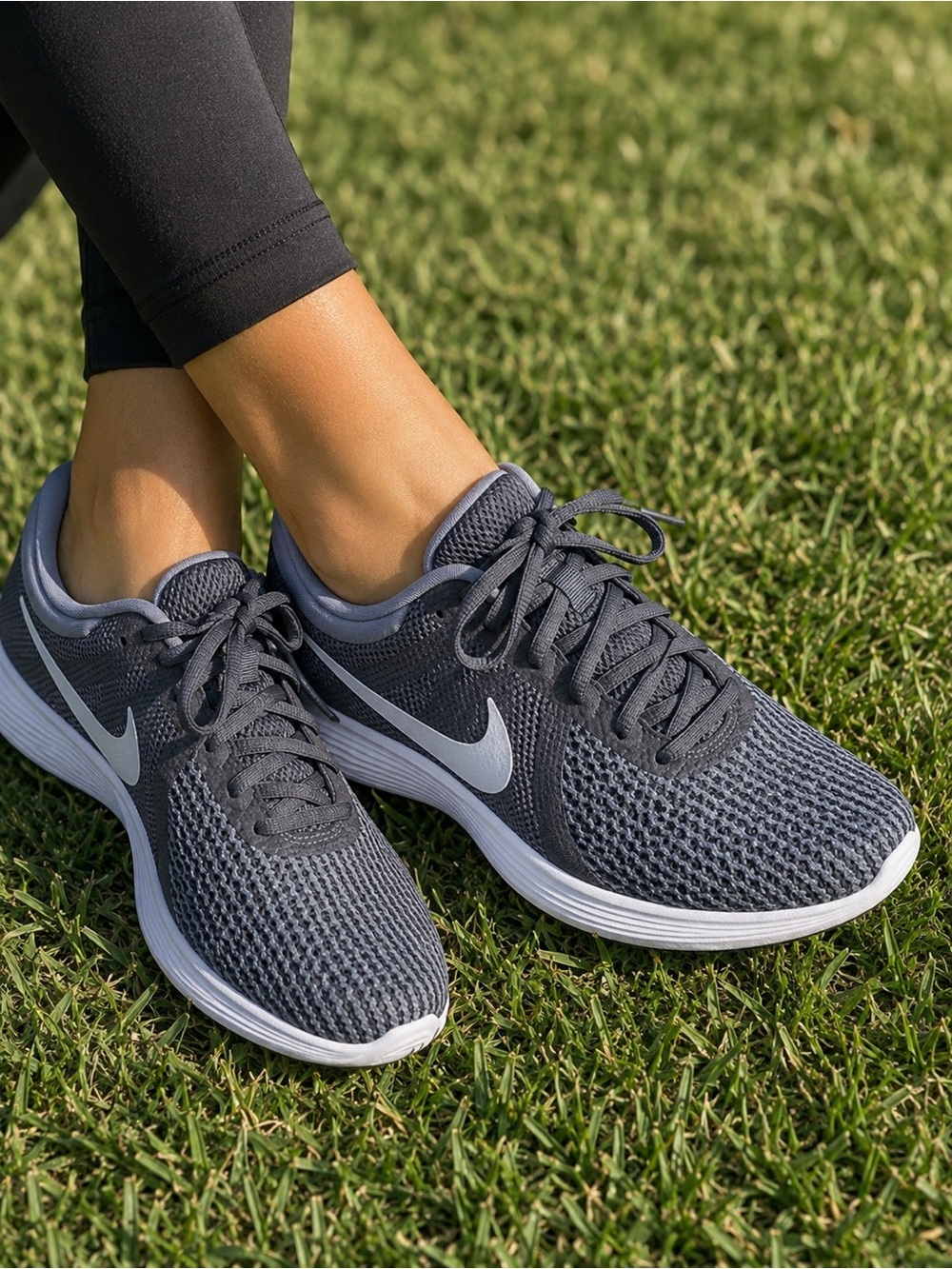 Nike Revolution 4 women’s Athletic Running Shoes  Gray
